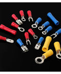 Get The ULTIMATE WVAIUPIX 1200 Pcs Mixed Assorted Lug Kit With Insulated Electrical Wire Connector Crimp Terminals Spade Ring Set Perfect For All Your CLH 22-10 AWG Projects And Heavy Duty Wiring Hauls Today. Assorted insulated crimp terminals on black background