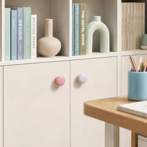 Six Pack Round Wooden Cabinet Knobs In Crisp White With Trimmable Screws For Zero Fuss Dresser And Closet Swaps With Pink And Purple Accents.