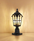 Hardwired 120V Dusk To Dawn Outdoor Post Light Black Roman Aluminum Pole Lamp with pier mount base illuminated indoors.