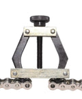 Chain link puller tool with screw clamp and roller chain segments; metal construction for motorcycle/bicycle chain repair