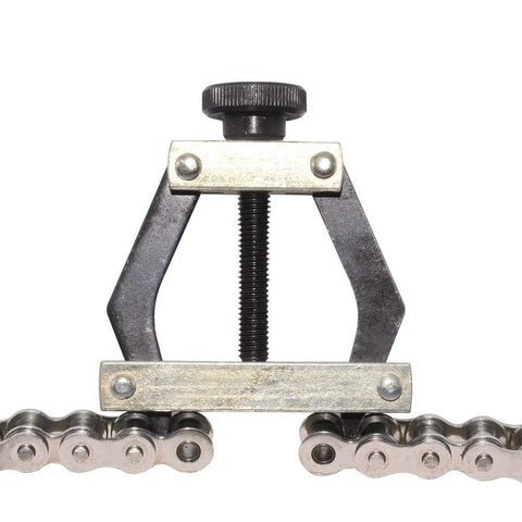 Chain link puller tool with screw clamp and roller chain segments; metal construction for motorcycle/bicycle chain repair