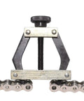 Roller Chain Tools Kit 25-60 Holder Puller And Breaker Cutter for Bicycle Motorcycle Go Kart ATV shown in use on a chain