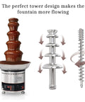 Multi Tier Chocolate Fondue Fountain With Steady Drip For House Parties And Buffets, showing chocolate flowing from a steel tower.