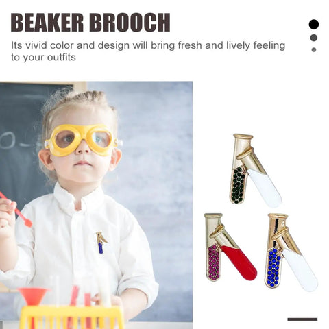 Child wearing yellow safety goggles with 4 Piece Chemistry Beaker Brooch Set With Flask Design, Metal Alloy Scientist Lapel Pins for Lab Coats.