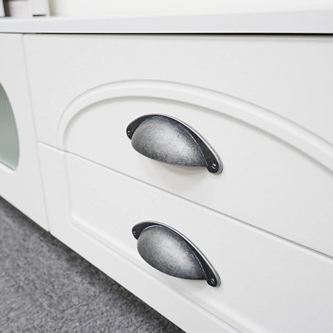 10 Pack 3 Inch Cabinet Cup Pulls Matte Black Swedish Iron Drawer Hardware installed on white cabinet drawers