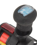 Close-up of Dump Truck PTO Switch With Beefy Build And Efficient Proportional Control Valve featuring textured grip and indicator lights.