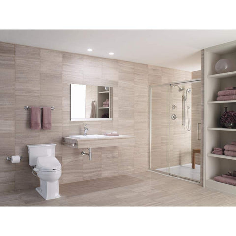 Bright bathroom with modern shower, toilet, and mirror above sink; not depicting the Forte Centerset Bathroom Faucet With Two Handles.