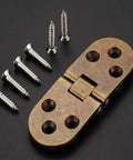 Dead Nuts Heavy Duty Flip Top Hinges Built Like A Tank For Sewing Tables And Butler Trays with screws on black background.
