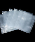100 Pack Small Vacuum Sealer Bags 2.7x3.9 Inches Open Top Clear Pouches for Food Storage with Textured Back on black background