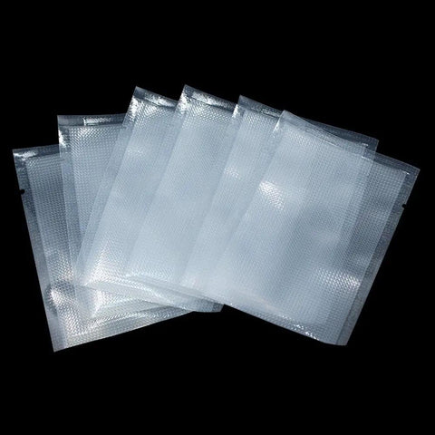 100 Pack Small Vacuum Sealer Bags 2.7x3.9 Inches Open Top Clear Pouches for Food Storage with Textured Back on black background