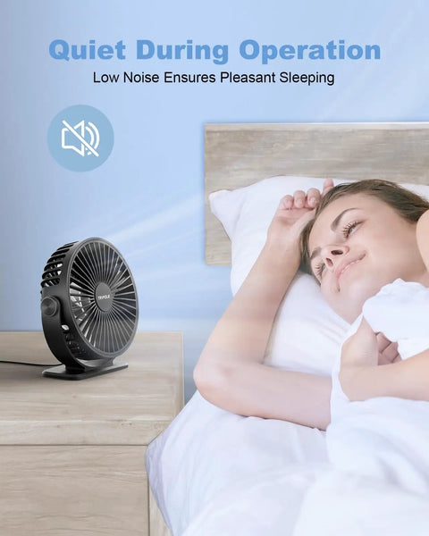 Tiny But Mighty USB Desk Fan With Three Speeds, 360 Degree Rotation on nightstand near sleeping person