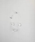 Polished Chrome Acrylic Tub And Shower Faucet Trim Kit With Two Handles For An Easy Bath Upgrade against white tile wall