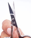 Curved Micro Serrated Eyebrow Scissors Made From Surgical Grade Stainless Steel, close-up of blades.