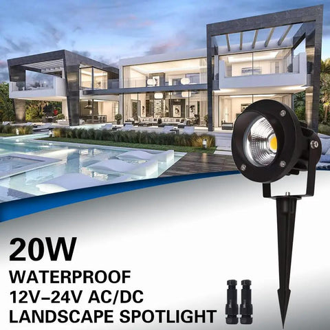 20W Led Outdoor Landscape Spotlight Kit With Stake Waterproof 12V To 24V AC DC Low Voltage Garden Lighting For Trees And Flags Ultra Warm 3000K 4 Pack next to modern house