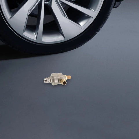 Quick Dump Valve for Tire Changer Machines with Bead Breaker Cylinder, heavy-duty metal valve shown beside tire wheel