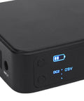 Close-up of Heavy Duty UPS Battery Backup With Massive 18000 Mah Reserve, showing input ports and battery charge indicator.
