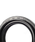 Close-up of a seal from Beefed Up Front Wheel Bearings And Seals Kit For Foreman 400 450 500 Rincon Rubicon 650 680 ATV Models 1995 To 2014 TRX Codes TRX400FW TRX450S TRX500 TRX650 TRX680