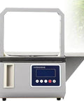 Automatic Tape Tying Machine With Foot Pedal Trigger And Optic Sensor For Produce Bagging Dual Mode Digital Display, front view.
