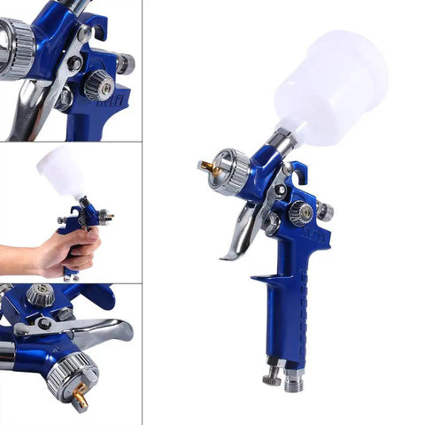 Blue Gravity Feed Hvlp Mini Air Spray Gun With 0.8Mm Nozzle for precise auto touch ups in hand, showcasing stainless steel body.