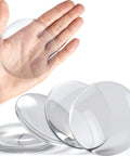 Clear Rubber Door Stoppers Extra Large Self Adhesive Wall Protectors Invisible Drywall Shields For Heavy Door Knobs Stick On Guard Bumpers in hand showing size and clarity.