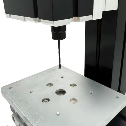 EssSthmy 36W All-Metal Mini Drill Press Lathe With 20000 RPM High Precision For Wood, Soft Metal, And Plastic close-up of drill chuck and table surface.