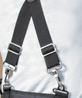 Person wearing Rugged Cordura Suspenders With Heavy Duty Padding For Electricians And Carpenters, showing adjustable snap hooks.