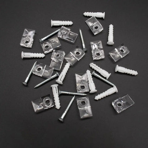 22 Piece Mirror Clip Kit With Screws For Easy Install And Hanging Glass Includes Crystal Clear Plastic Clips scattered on black surface