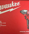 This Badass M12 Cordless Impact Driver Kit with Two 12 Volt Batteries and Charger on red background.