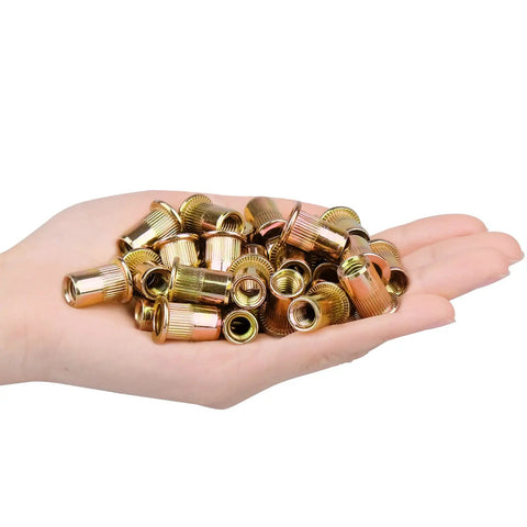 Tough As Nails M6 Metric Rivet Nuts Forged From Zinc Plated Carbon Steel With Knurled Flat Bodies For Secure Threaded Inserts That Lock Tight Without Messy Burrs Includes Forty Pieces in hand.