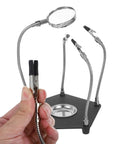 Universal Soldering Helping Hands Tool with adjustable arms and stable base for PCB repair and electronics welding station accessories.