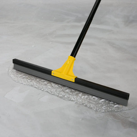 Built Tough 24 Inch Floor Squeegee With 60 Inch Extendable Handle for Concrete and Tile Floors in action on wet surface