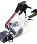 Garage Beast Variable Speed Belt Sander And Metal Polisher With A Wide 72 To 82 Inch Sanding Belt And 3 Grinding Wheels Paired With A Rock Solid Base 110V on a workbench with a motor.