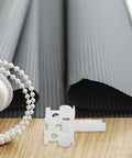 Dead Simple And Tough Vertical Blind Replacement Parts With Slick Pull Pulleys Plus Quick Fix Carrier Kits For Window Curtain Wands and Sturdy Plastic Home Office Repair Gear with white carrier kit and bead chain.