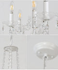 Close-up of Six Light White Crystal Candle Chandelier with clear pendant ornaments and prewired design for easy install.