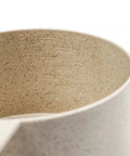 Wheat Straw Measuring Cups And Spoons Set Ten Piece For Cooking And Baking with engraved measurement markings inside a cup