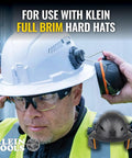 Worker adjusting Ear Muffs With Full Brim Hard Hat Attachment For Construction And Manufacturing Pros On The Jobsite, 26 dB NRR