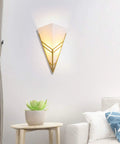 Modern Black Acrylic Wall Sconce Minimalist Bedroom Bedside Lamp With Uniform Soft Glow For Living Room Decor And Creative Lighting Fixture To Elevate Your Space With Luxe Chic Style mounted on wall illuminating room.