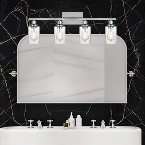 Sleek Modern 2 Light Vanity Light Fixture in matte black with clear glass shade, installed in bathroom above mirror.