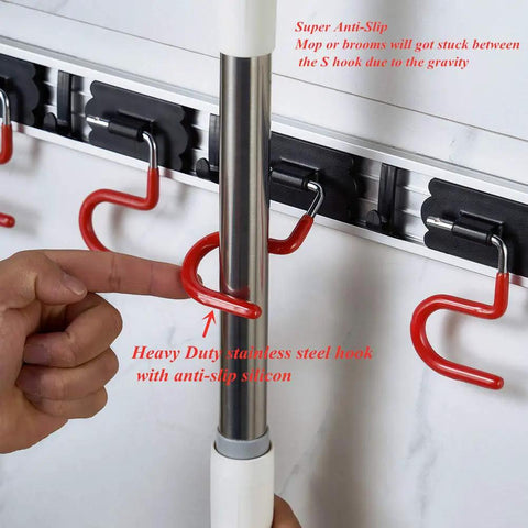 Space Saving Stainless Steel Wall Mount Mop And Broom Holder With S Type Grippers No Fuss Anti Slip Mop Rack in use