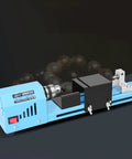 Dirt Cheap Mini Wood Lathe For Benchtop Projects Steel Build 150W Compact Desktop Woodturning Machine showing blue steel frame and motor.