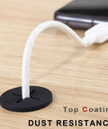 Premium Flexible Silicone Cable Cord Grommet Set 1 Inch Black for desk hole cover with cable passing through on wood surface.
