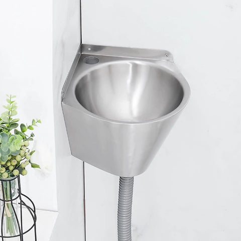 Bathroom Sink Wall-Mounted Corner Bathroom Sink Stainless Steel Round Sink Single with drain hose and plant in view.