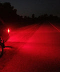 Car at night with Red 3156 3157 LED Turn Signal Bulbs for T25 Set of 2 Hella Bright Back Up Reverse Brake Tail Lights illuminating the road
