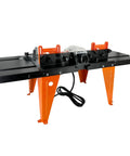 Total Game Changer Universal Benchtop Router Table With Premium Die Cast Aluminum Table Top Compatible With Any Router Up To Six Inch Base Plates For Tight Woodshop Grind on orange legs.
