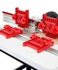 Rock Solid Variable Pressure Featherboard 2 Pack Adjustable Tension Control For Router Tables And Table Saws with red grips on a cutting table.