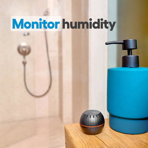 HT Black WiFi Temperature And Humidity Sensor on shelf beside toiletries in bathroom, compact design, no hub needed, 2 pack
