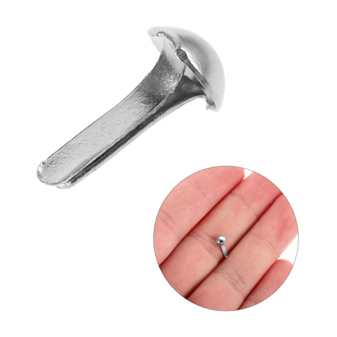 Close-up of silver iron brad in hand from 100 Pcs Iron Brads For DIY Crafting And Puppet Making Kit Durable Metal Fasteners For Paper Embellishments And Shadow Puppets Great For Creative Projects For All You Crafty Folks And Scrapbookers