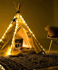 33ft Solar Rope Lights With 100 LEDs, 8 Modes, IP65 Waterproof Tube Lights illuminating a cozy indoor tent with warm white glow