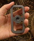 Hand holding Tough As Nails Fire Starter Tool For Camping And Hiking, Carbon Steel Fire Striker Without Stone, Quick Spark Emergency Flint