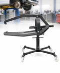 Beefy Three Jaw Brake Drum Puller With Adjustable Arms And Four Caster Legs For Cars And Trucks in workshop